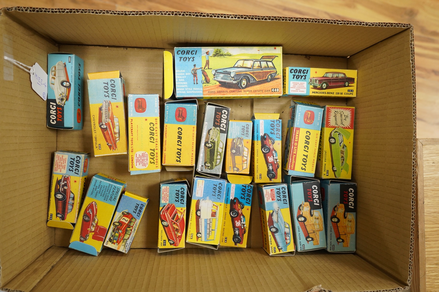 Twenty 1960s Corgi Toys, all playworn or restored examples in reproduction boxes, including cars, a milk float and two Land Rovers, etc., together with a quantity of additional diecast, etc. Vehicles by a variety of make